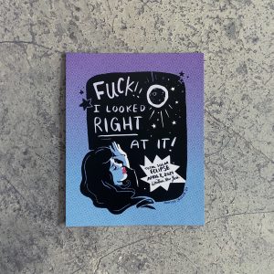 Wall art print black and white printed on blue and purple halftone. Featuring damsel in distress and reads Fuck! I looked right at it! TOTAL SOLAR ECLIPSE APRIL 8, 2024 Western New York"