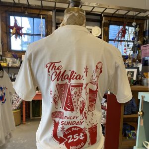 Back of a cream color shirt with red printing depicting a retro inspired image with a pin up girl on a keg of beer, a slice of pizza, sports pennants, 25 cent wing sign, chicken wing with blue cheese, pint of a beer and snowflake starbursts.