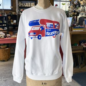 Buffalo Bills inspired shirt with the dog version of BILLS MAFIA. Sweatshirt features blue and red illustrations of dogs in a Buffalo Bills football party bus. Banner printed across the bills bus reads "The Pawfia". Sweatshirt is white.
